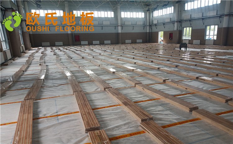 新疆克拉瑪依市獨山子虹園小區(qū)體育館木地板項目——歐氏實木運動地板